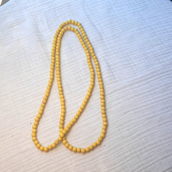 Jewelry - 48 inch long Vintage yellow wood beads necklace 1970's